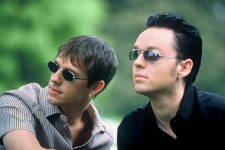 Two men sunglasses looking distance - sunglass free wallpaper