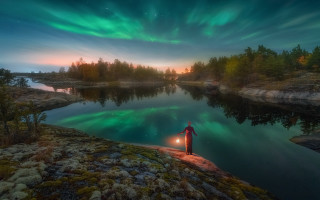 Person lake aurora lantern magic - a green aurora free wallpaper