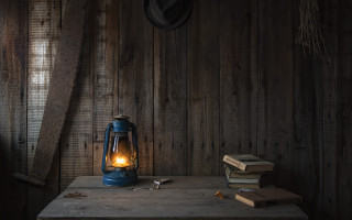 Blue lantern wooden table books - free light wallpaper