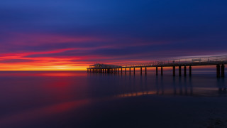 Pier train sunset ocean matte - mystical color free wallpaper