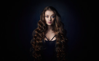 Woman curly long hair blue - flowing hair free wallpaper