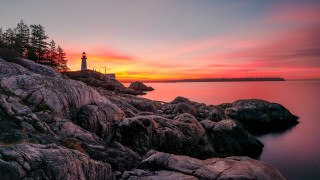 Lighthouse rocky shore sunset red - a rocky shore free wallpaper