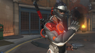 City street costumed hero weapon - a building in the background free wallpaper