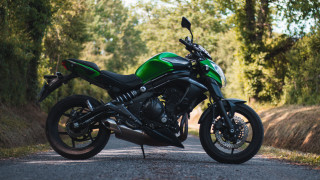 Green motorcycle forest road helmet - a road next free wallpaper
