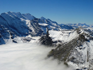 Snowy mountain range blue sky 9 - under a blue sky free wallpaper