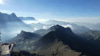 Mountain range clouds buildings people - the top of the mountain free wallpaper