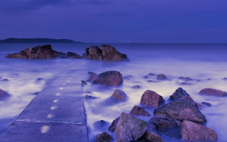 Pier rocky beach ocean night - a long pier free wallpaper