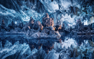 Large cave lake rocks water - a reflection free wallpaper