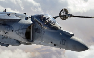 Fighter jet cloudy sky pilot - a propeller free wallpaper