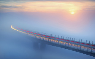 Bridge red light foggy sunset - volumetric fog free wallpaper