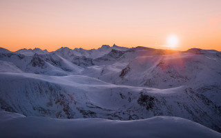 Mountain sunset skier snowy horizon - ski free wallpaper