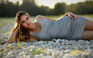 Woman rock ground crossed posing - ground free wallpaper