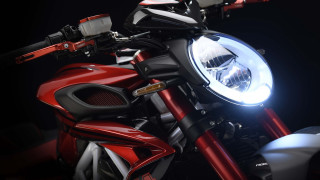 Motorcycle closeup headlight black background - motorcycle free wallpaper