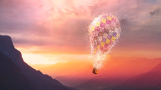 Hot air balloon sunset mountains - a hot air balloon free wallpaper