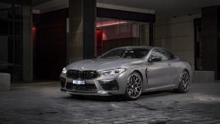 Silver bmw car parking garage - a parking garage free wallpaper