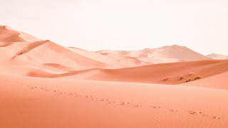 Desert mountain footprints sunset gradient - the sand free wallpaper