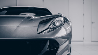 Sports car garage open door - a sports car free wallpaper