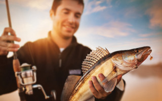 Man fishing fish portrait blurry - chippy free wallpaper