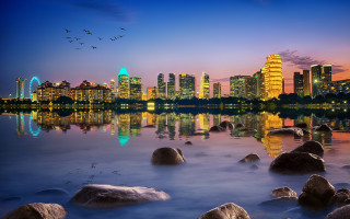 City skyline reflection dusk rocks - dusk free wallpaper