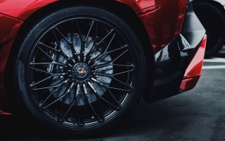 Red sports car black rim - a red sports car free wallpaper