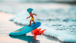 Toy surfer beach waves ocean - a surfboard free wallpaper