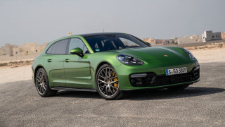 Green porsche panamera cityscape 3d - private press free wallpaper