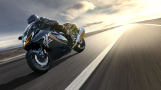 Motorcycle sunlight road blurry background - motion blur free wallpaper for desktop