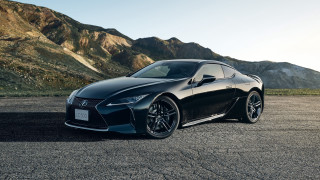 Black sports car mountains blue 2 - a blue sky in the foreground free wallpaper