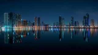 City skyline night reflection bridge 4 - a reflection free wallpaper