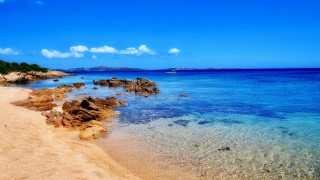 Beach boat rocks sky clouds - the shore free wallpaper