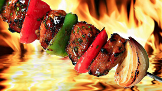 Skewer meat vegetables fire flames 2 - professional free wallpaper