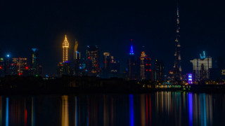 City skyline lake night lights 3 - the building and the water free wallpaper