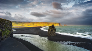 Black sand beach rock formation - a matte painting free wallpaper for desktop