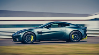 Blue sports car driving track - side profile free wallpaper