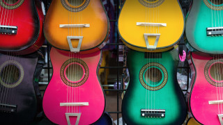 Colorful guitars store display tilt - black free wallpaper for desktop