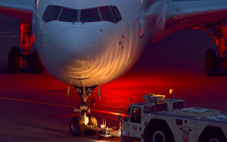 Jetliner airport tarmac truck backlit - the tarmac free wallpaper