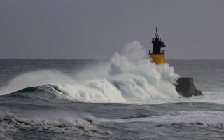 Lighthouse wave stormy ocean cloudy - stormy weather free wallpaper