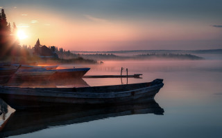 Sunset boat water clouds mountains - sunrise free wallpaper