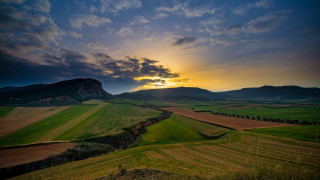 Sunset green field mountains cloudy - beautiful landscape free wallpaper for desktop