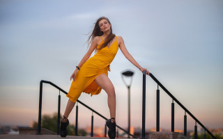 Yellow dress posing outdoors blurry - a rail free wallpaper