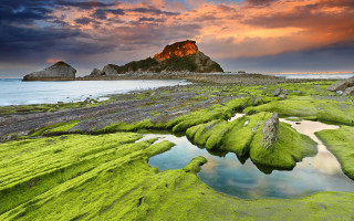Green beach rock formation sunset - beautiful scenery free wallpaper for desktop