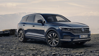Blue volkswagen suv mountains water - cloudy free wallpaper