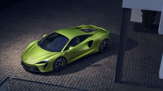 Green sports car brick road - a green sports car free wallpaper