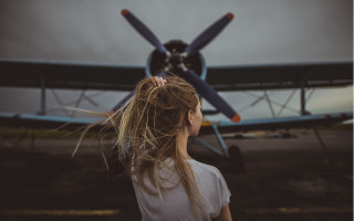 Girl airplane longhair blurry cinematic - the back of the plane free wallpaper