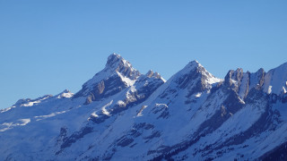 Mountain range snowy peak plane - a mountain range free wallpaper