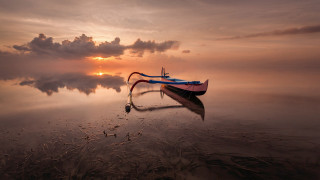 Boat lake sunset cloudy sky 3 - top of a lake under a cloudy sky free wallpaper