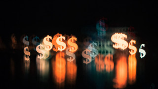 Blurry lit sign dollar fire - deep depth of field free wallpaper
