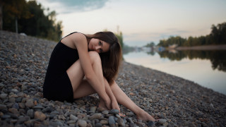 Woman rocky beach lake portrait - a rocky beach next free wallpaper