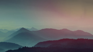 Mountain range hazy sky trees - a mountain range free wallpaper