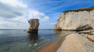 Rock water beach formation mountain - the water near a beach free wallpaper
